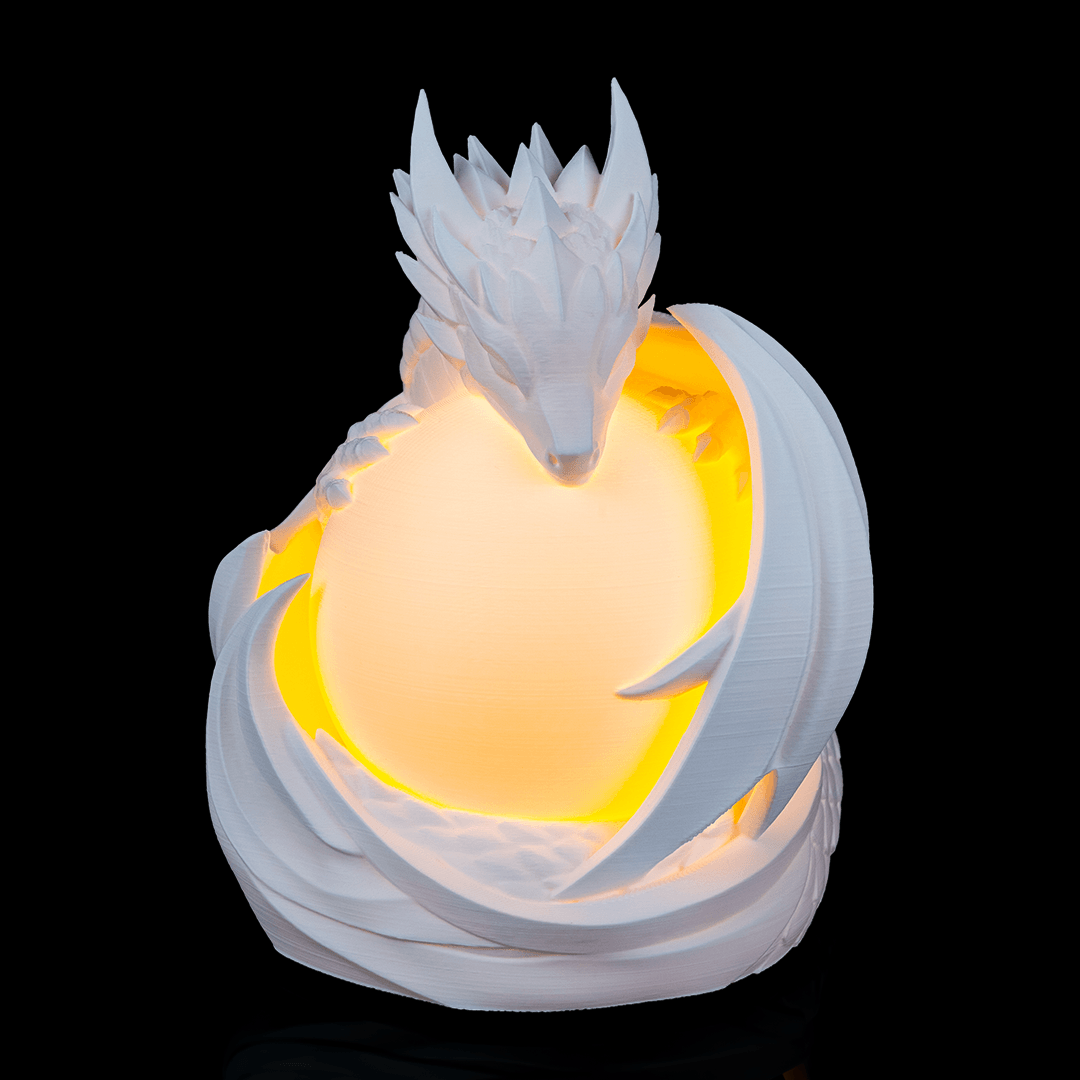 Side view of Dragon Sphere Desk Lamp showing detailed dragon figure surrounding spherical light