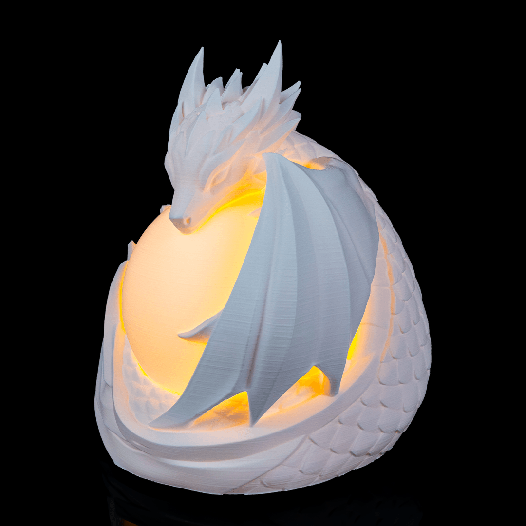 Close-up of Dragon Sphere Desk Lamp highlighting dragon scales and layered sculptural details