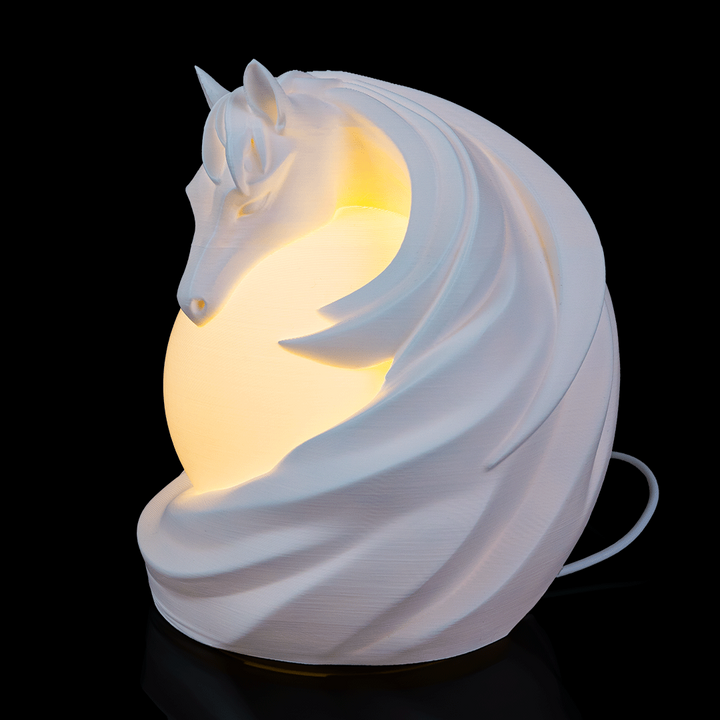 Side view of Stallion Sphere Desk Lamp showing detailed stallion figure surrounding spherical light