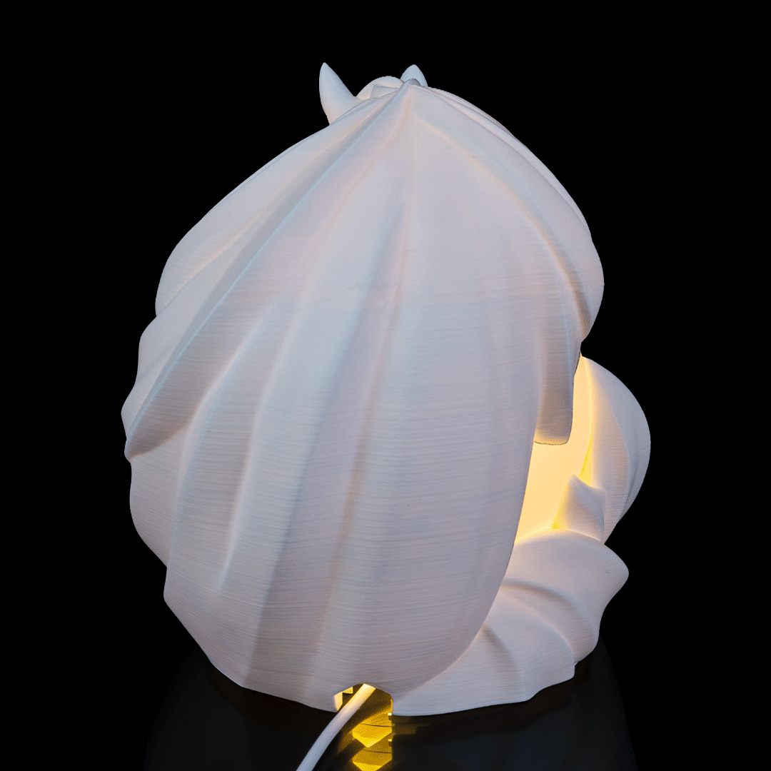 Close-up of Stallion Sphere Desk Lamp highlighting horse features and layered sculptural details