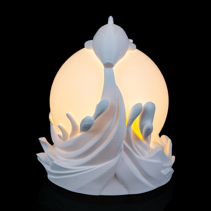 Side view of Twin Fish Sphere Lamp showing detailed fish design wrapped around spherical lamp