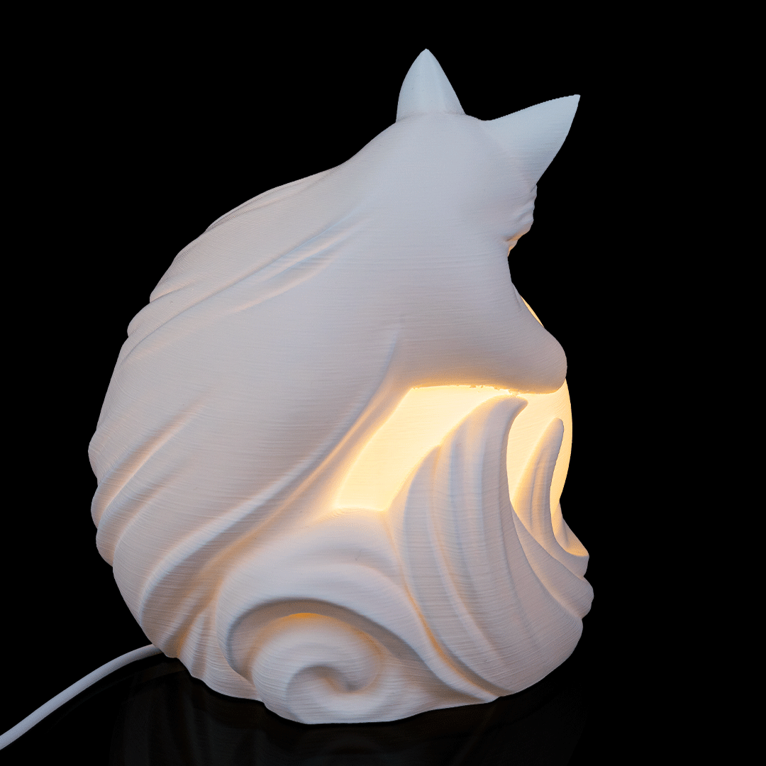 Close-up of Vulpine Sphere Desk Lamp highlighting fox features and layered sculptural details