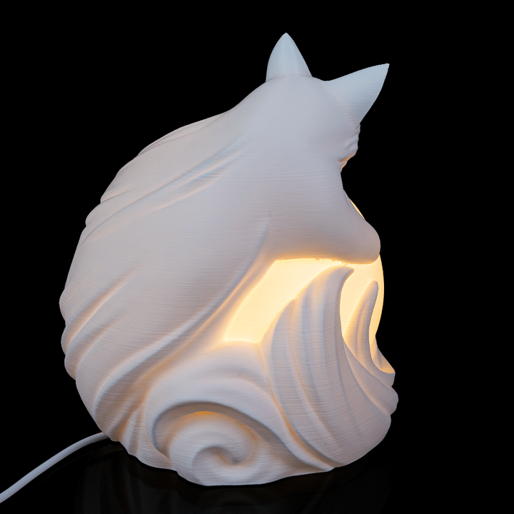 Close-up of Vulpine Sphere Desk Lamp highlighting fox features and layered sculptural details